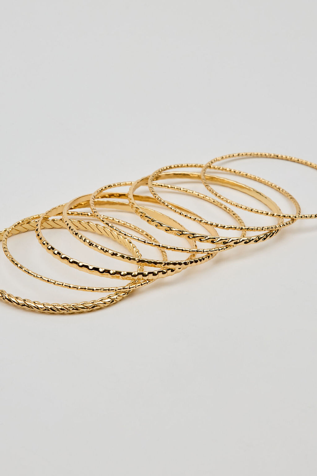Ensemble de 11 bracelets texturés