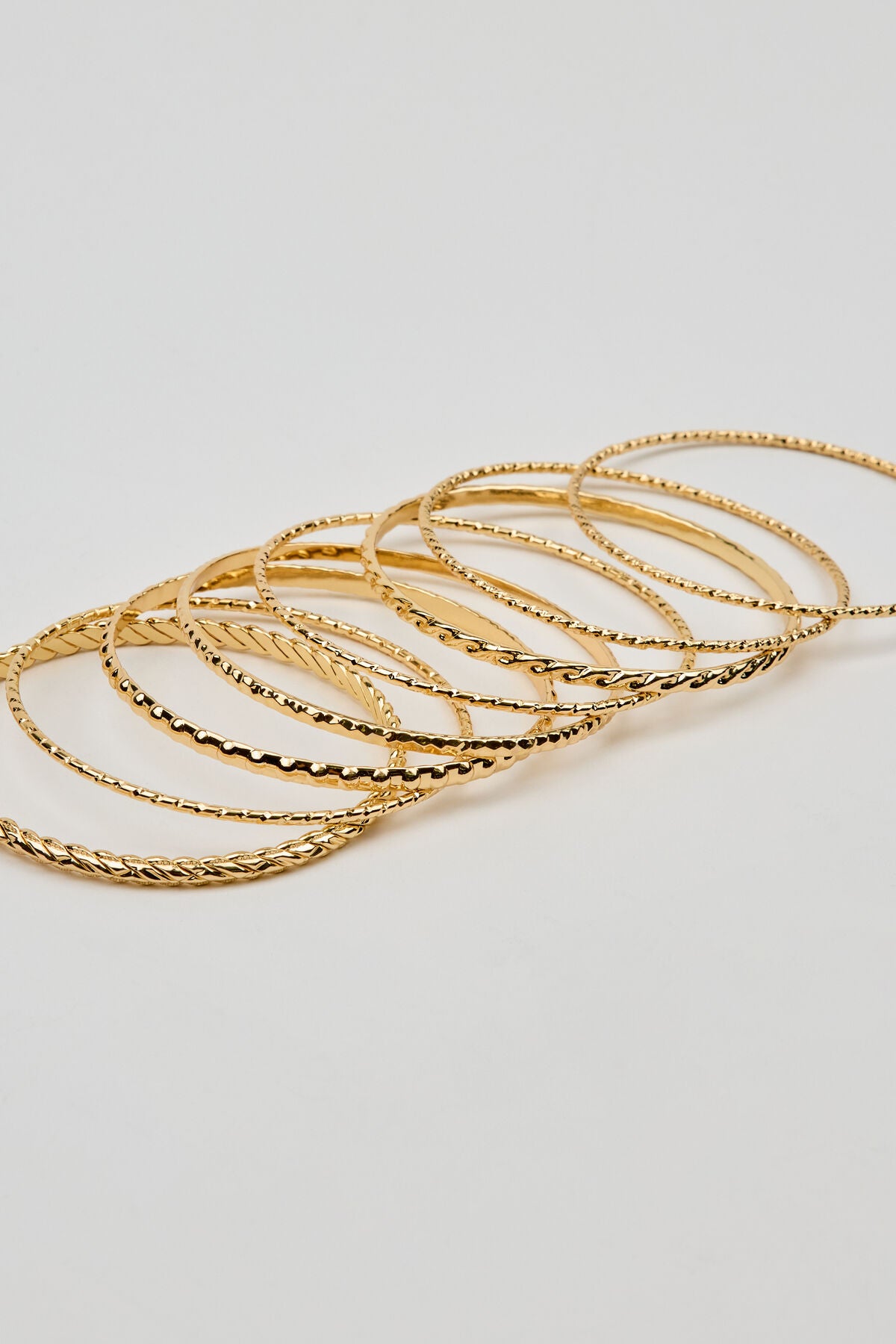 Ensemble de 11 bracelets texturés