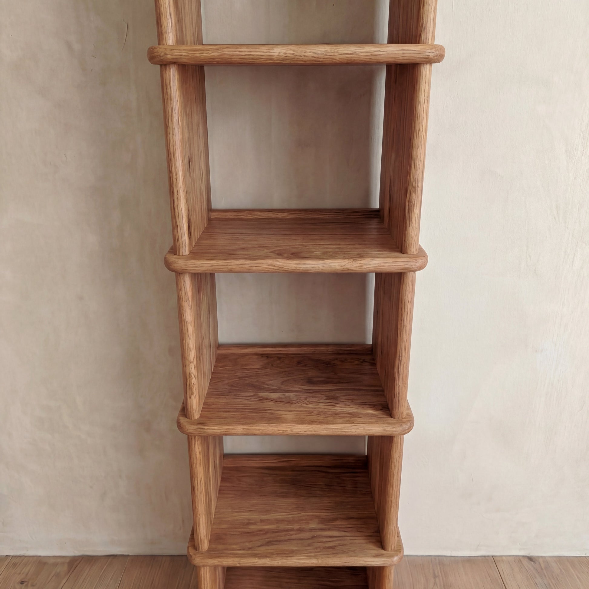 Tall narrow bookcase in red oak