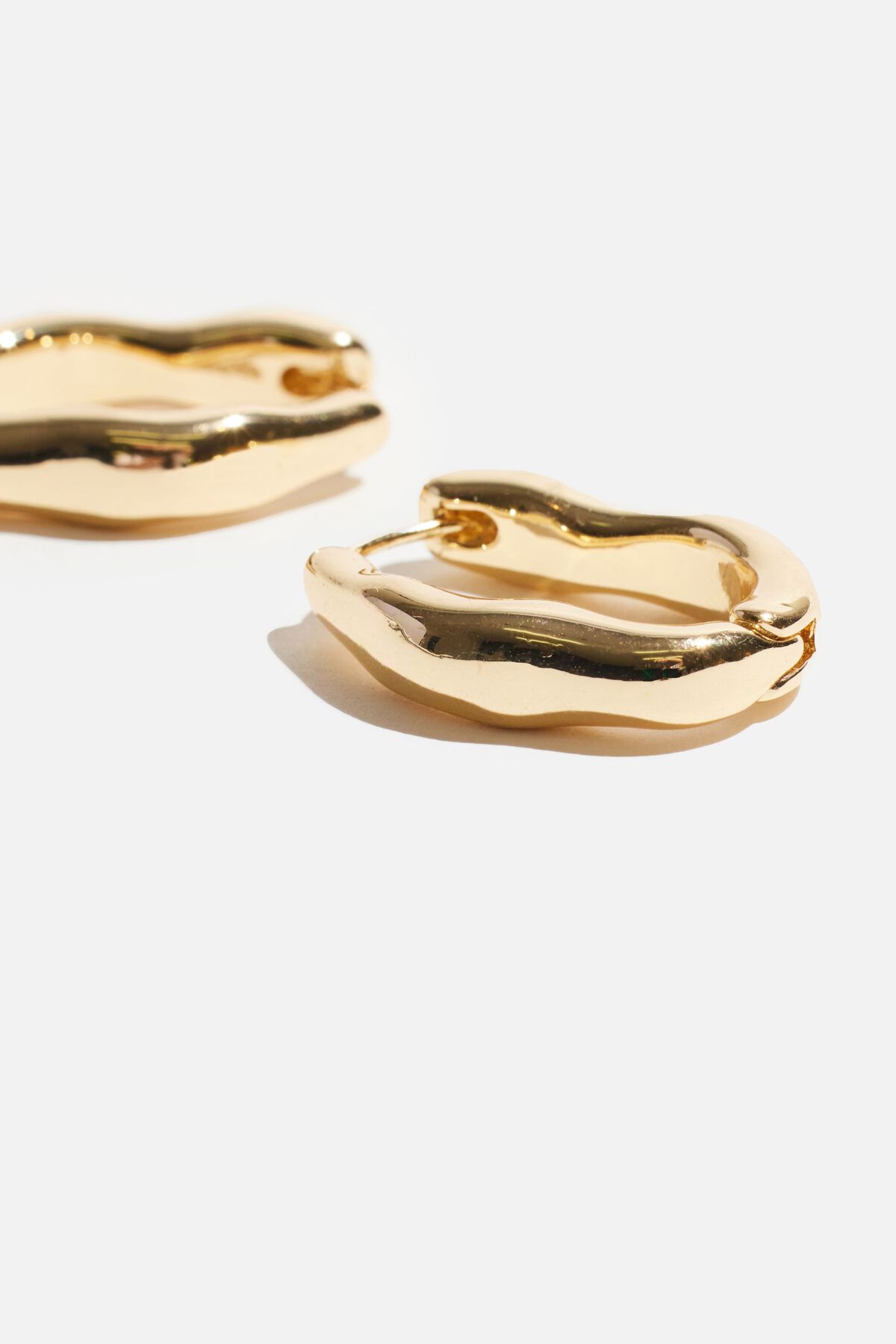 Boucles d'oreilles créoles à vagues