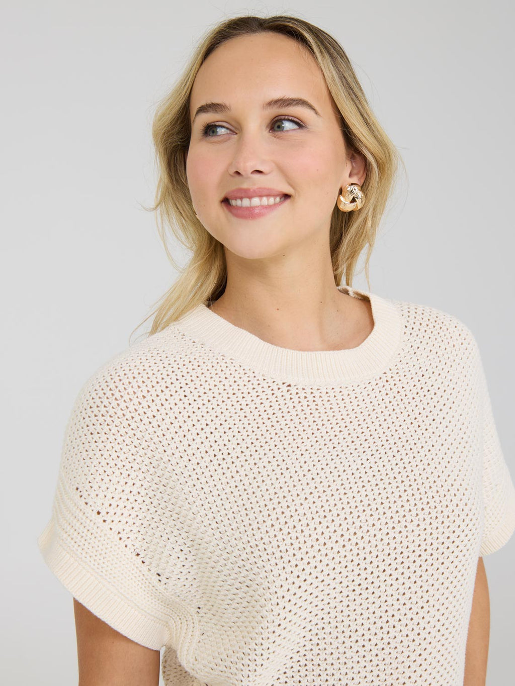 Pull au crochet à manches chauve-souris courtes