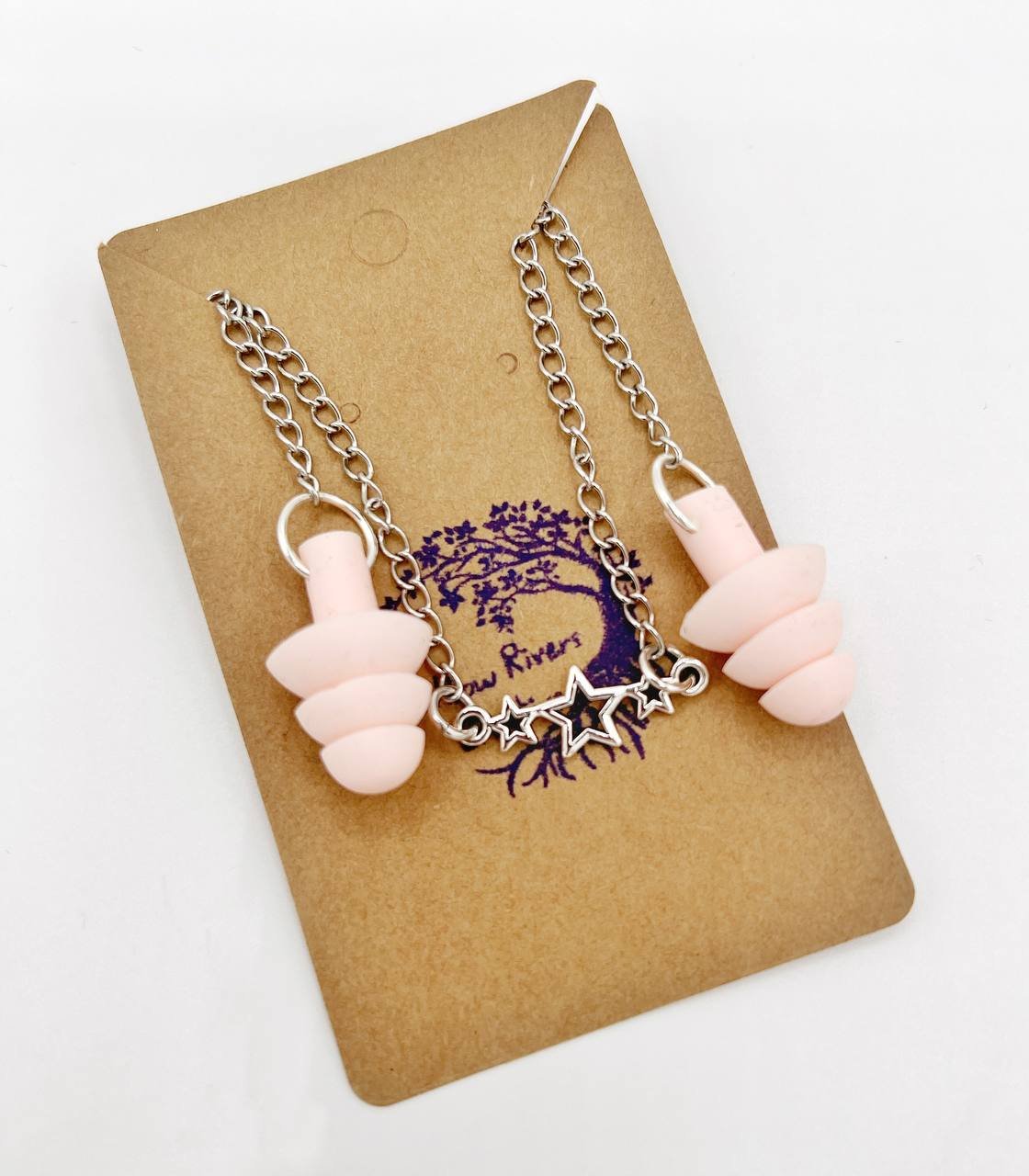 Collier minimaliste avec bouchons d'oreilles étoiles