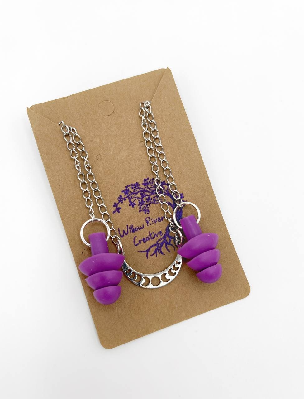 Collier minimaliste avec bouchons d'oreilles et phases de la lune