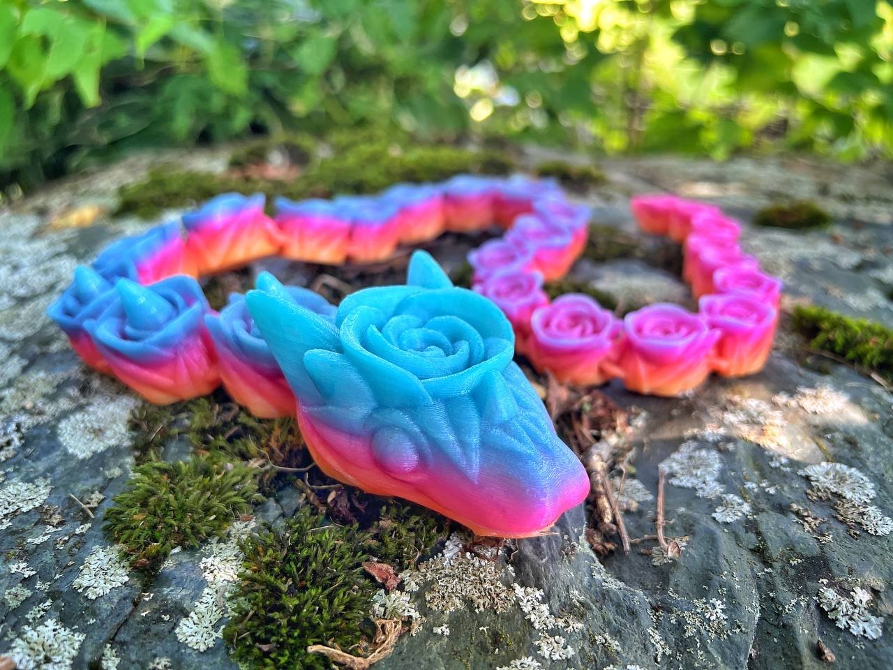 Glow in the dark rainbow rose snake adult fidget toy, 3d printed articulated sculpture.