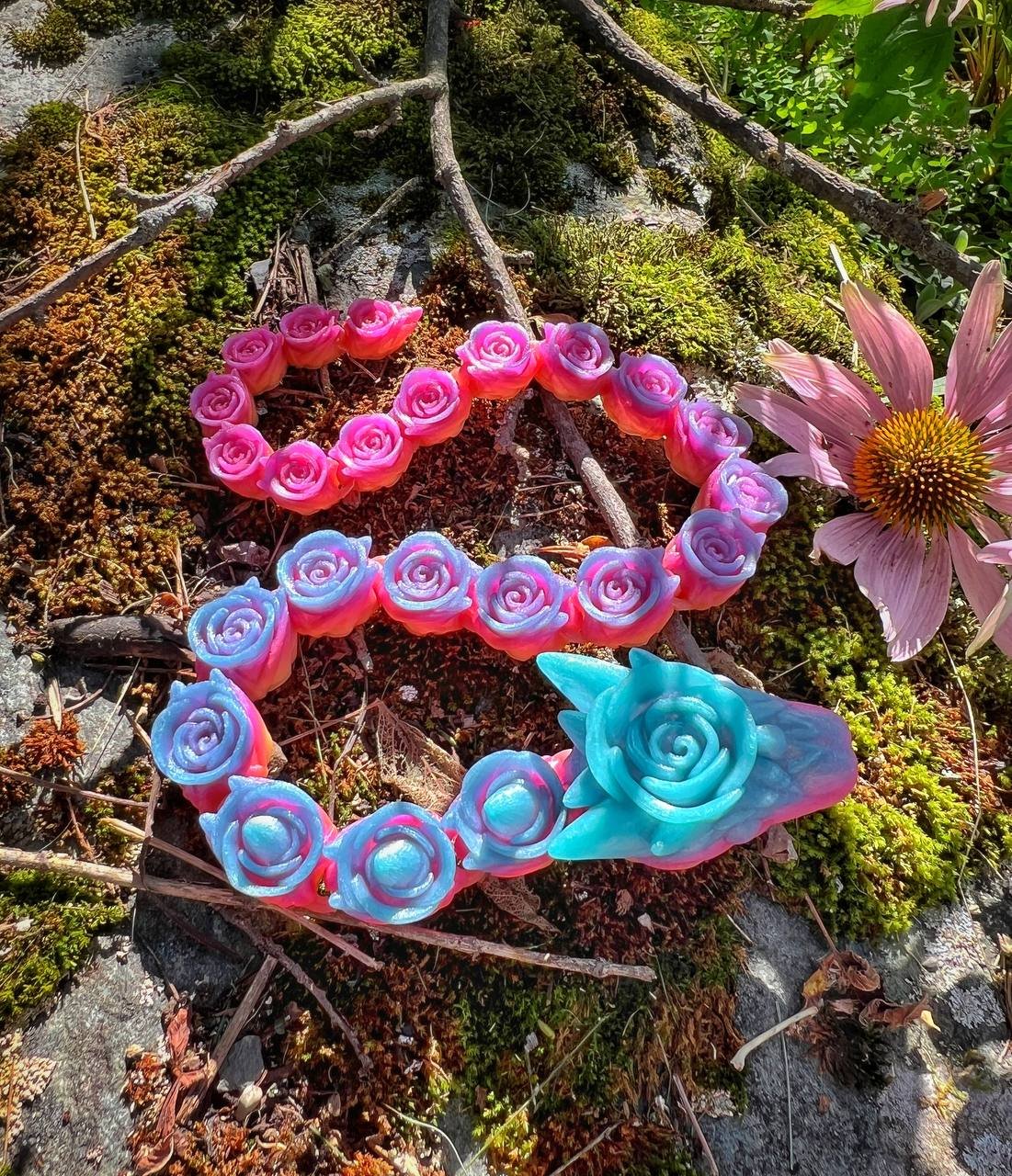 Glow in the dark rainbow rose snake adult fidget toy, 3d printed articulated sculpture.