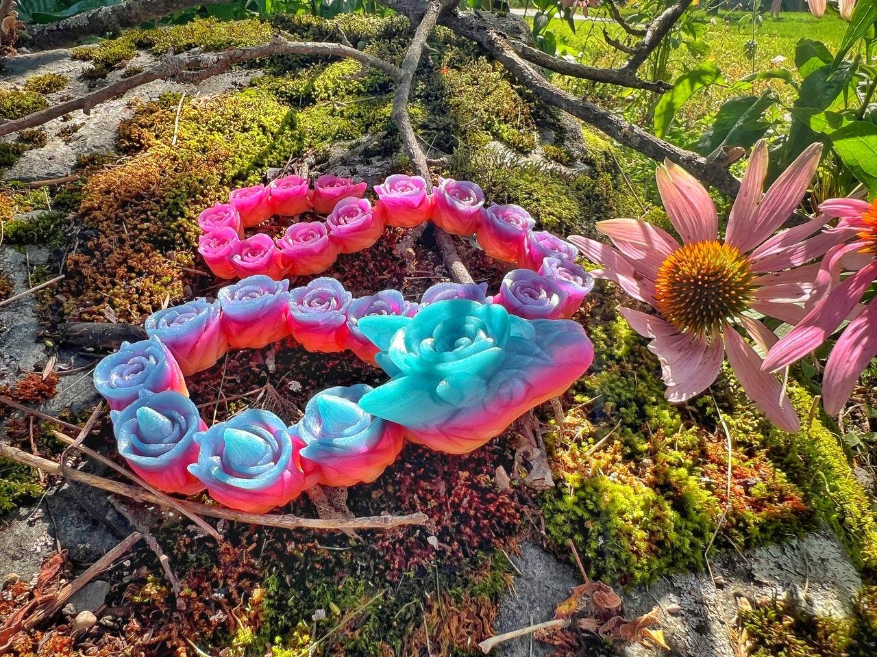 Glow in the dark rainbow rose snake adult fidget toy, 3d printed articulated sculpture.