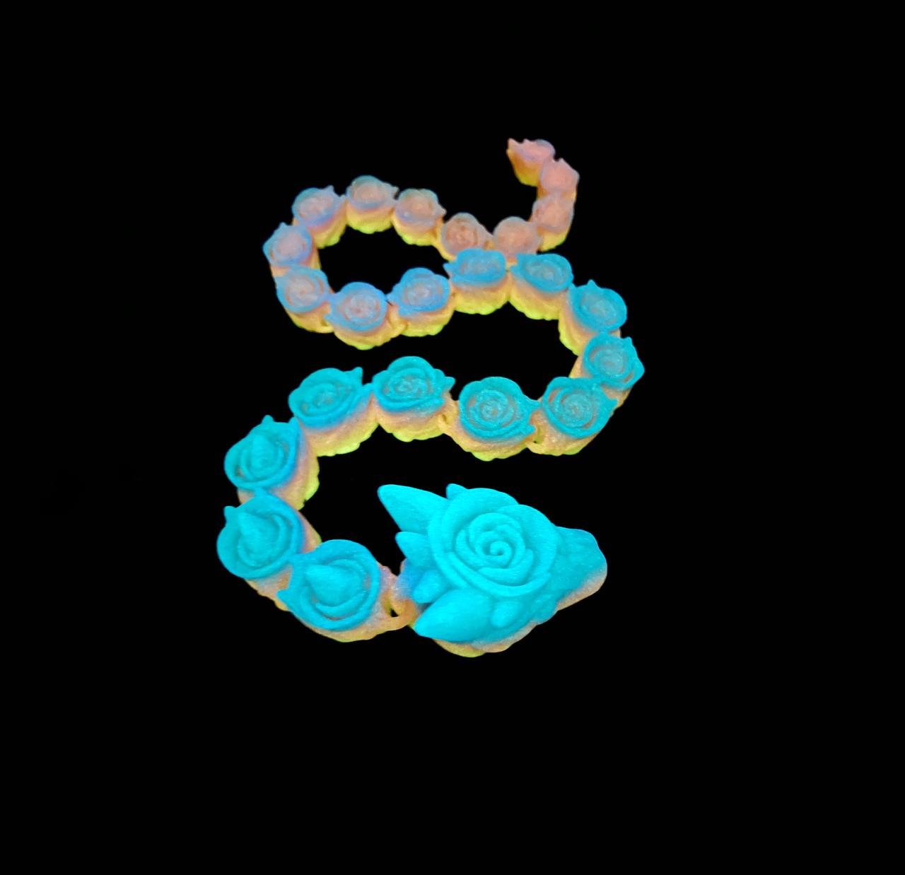 Glow in the dark rainbow rose snake adult fidget toy, 3d printed articulated sculpture.