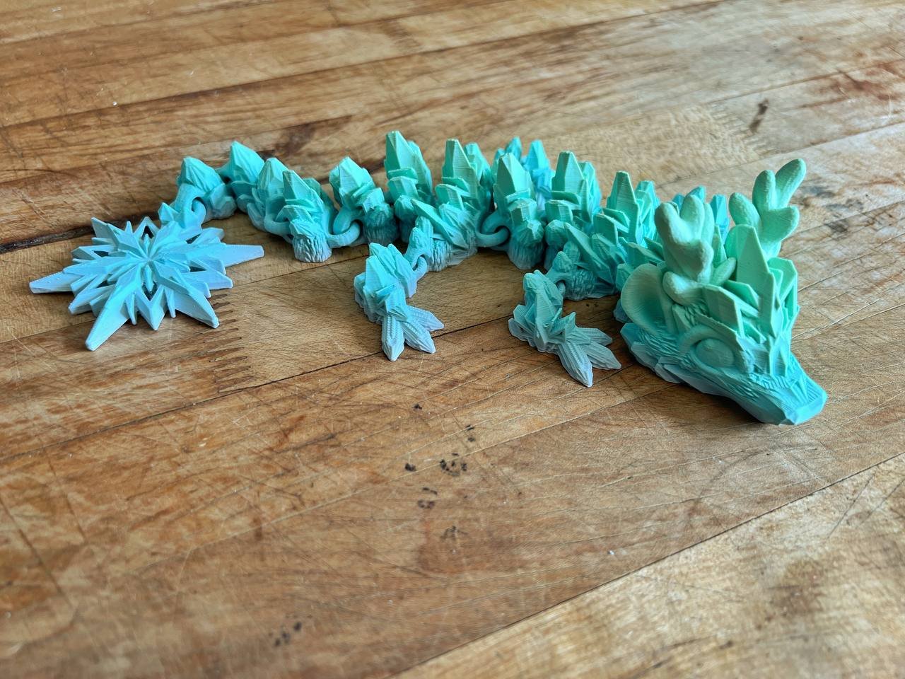 Snow flake baby articulated dragon fidget