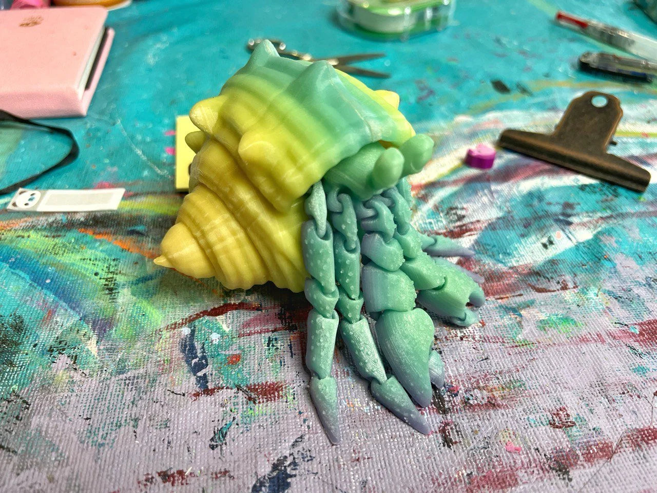 Yellow and Blue glow in the dark Hermit Crab Fidget Buddy