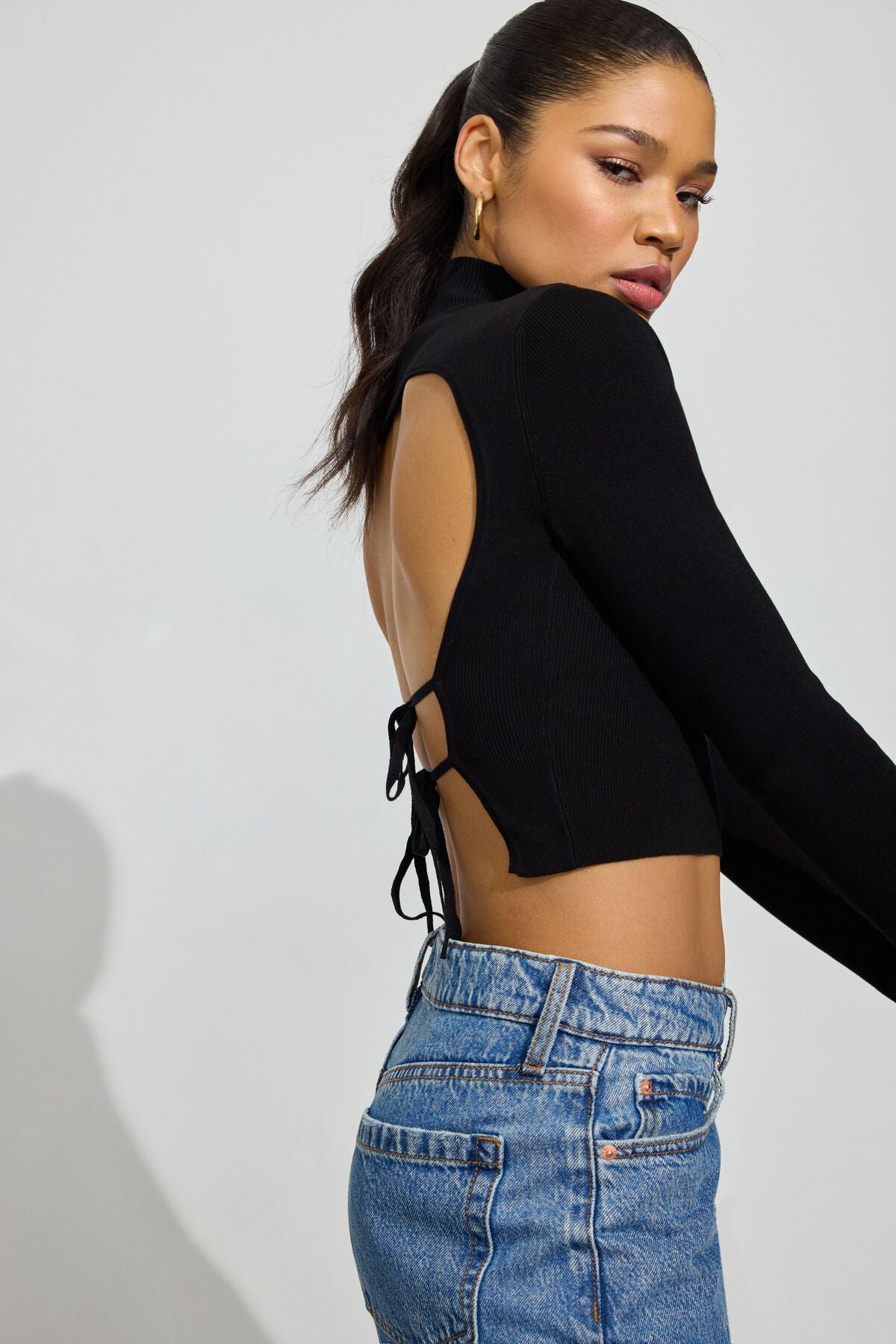 Pull à dos tablier