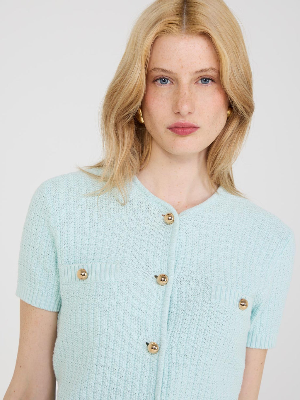 Pull boutonné à manches courtes