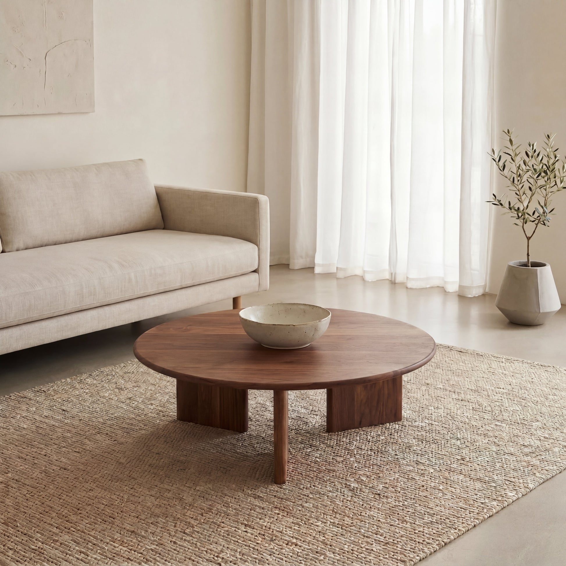 Round coffee table in walnut