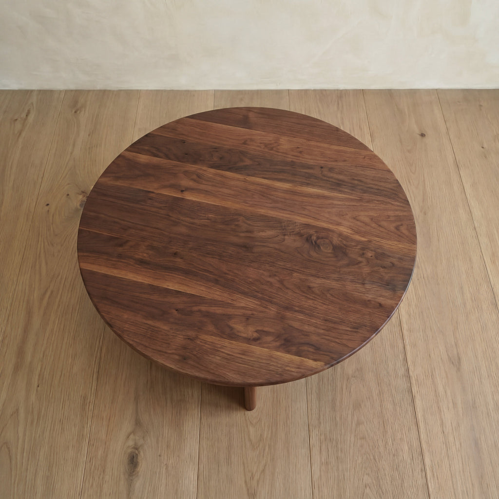Round coffee table in walnut