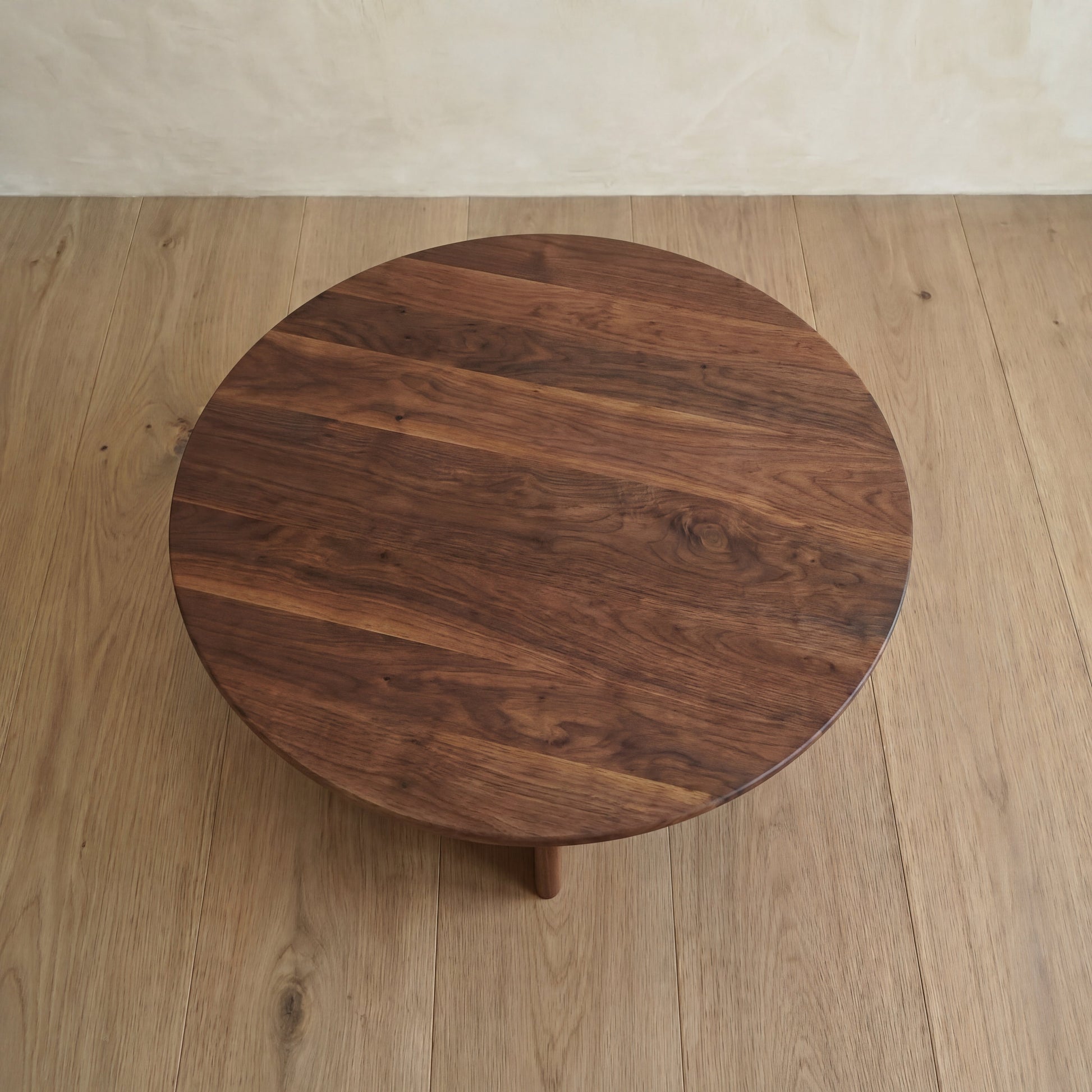 Round coffee table in walnut