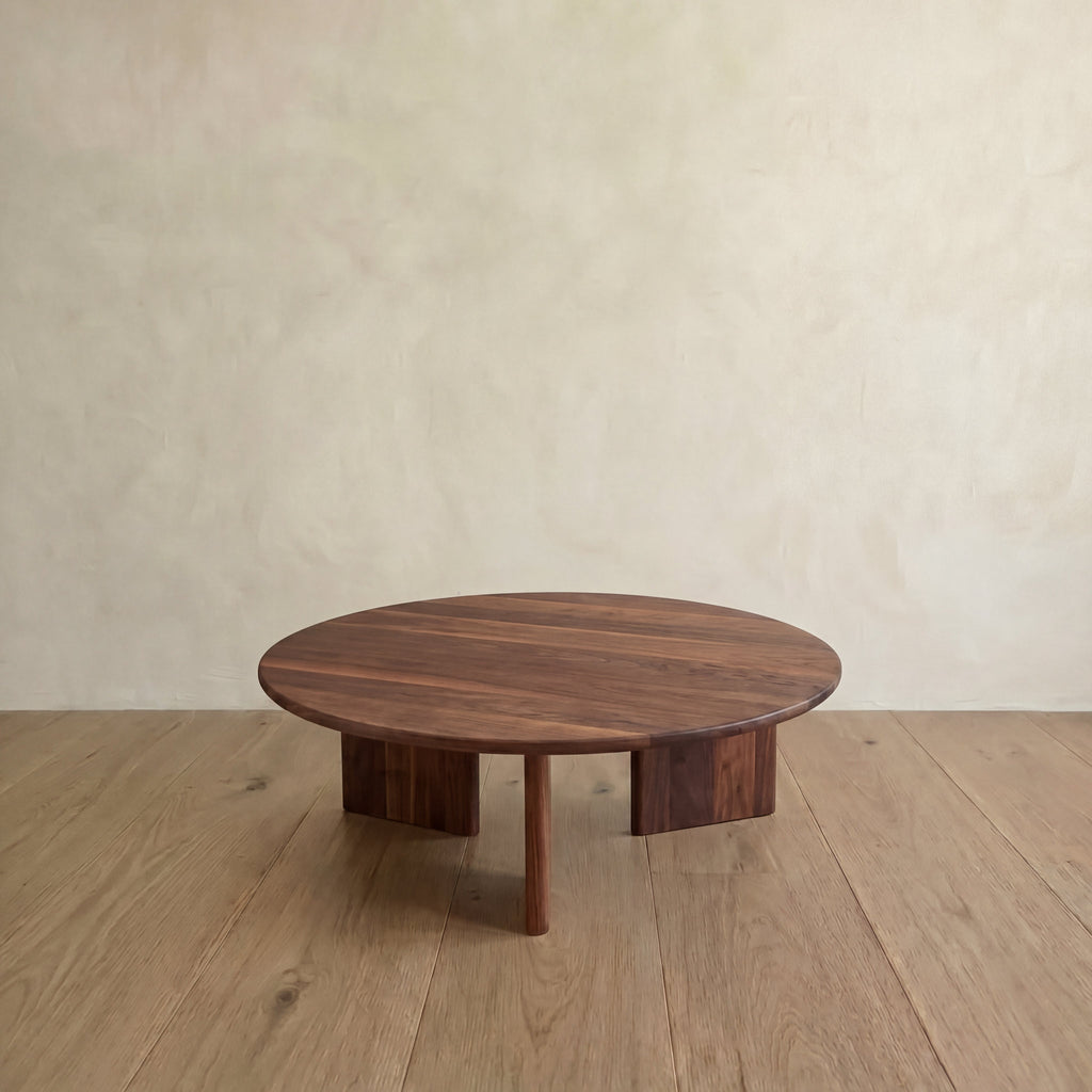 Round coffee table in walnut