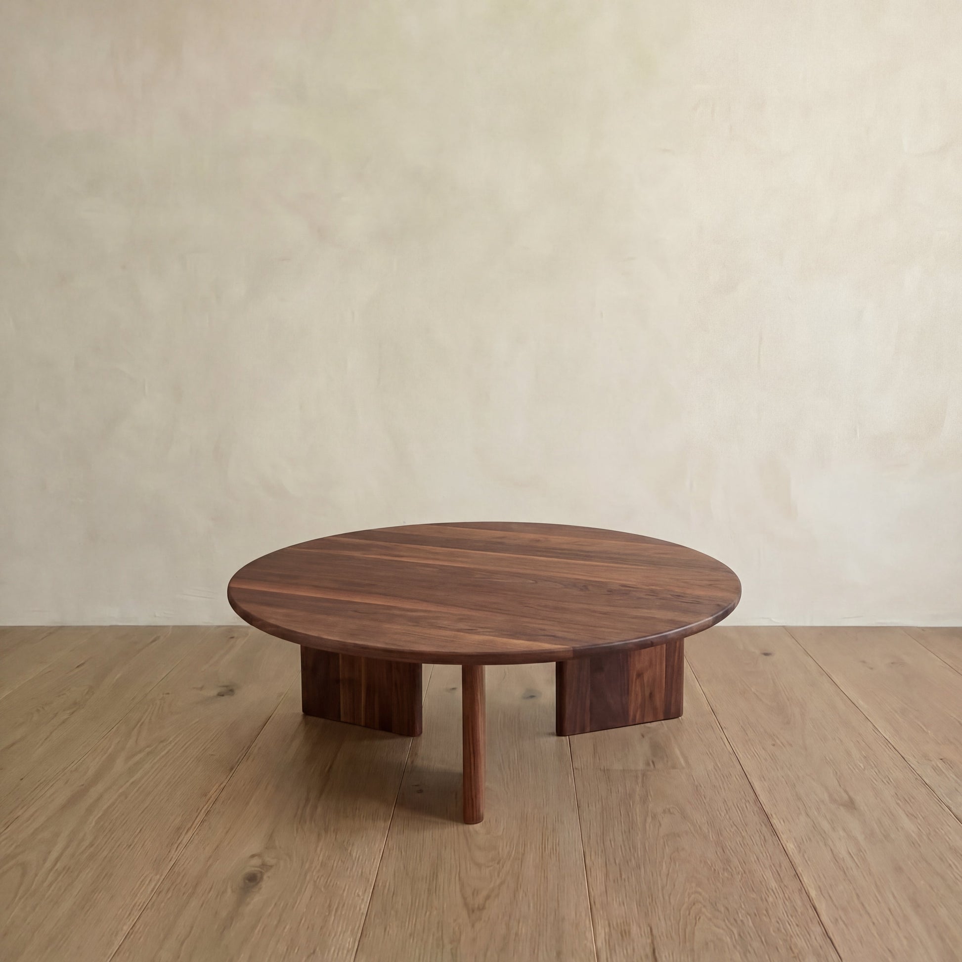 Round coffee table in walnut