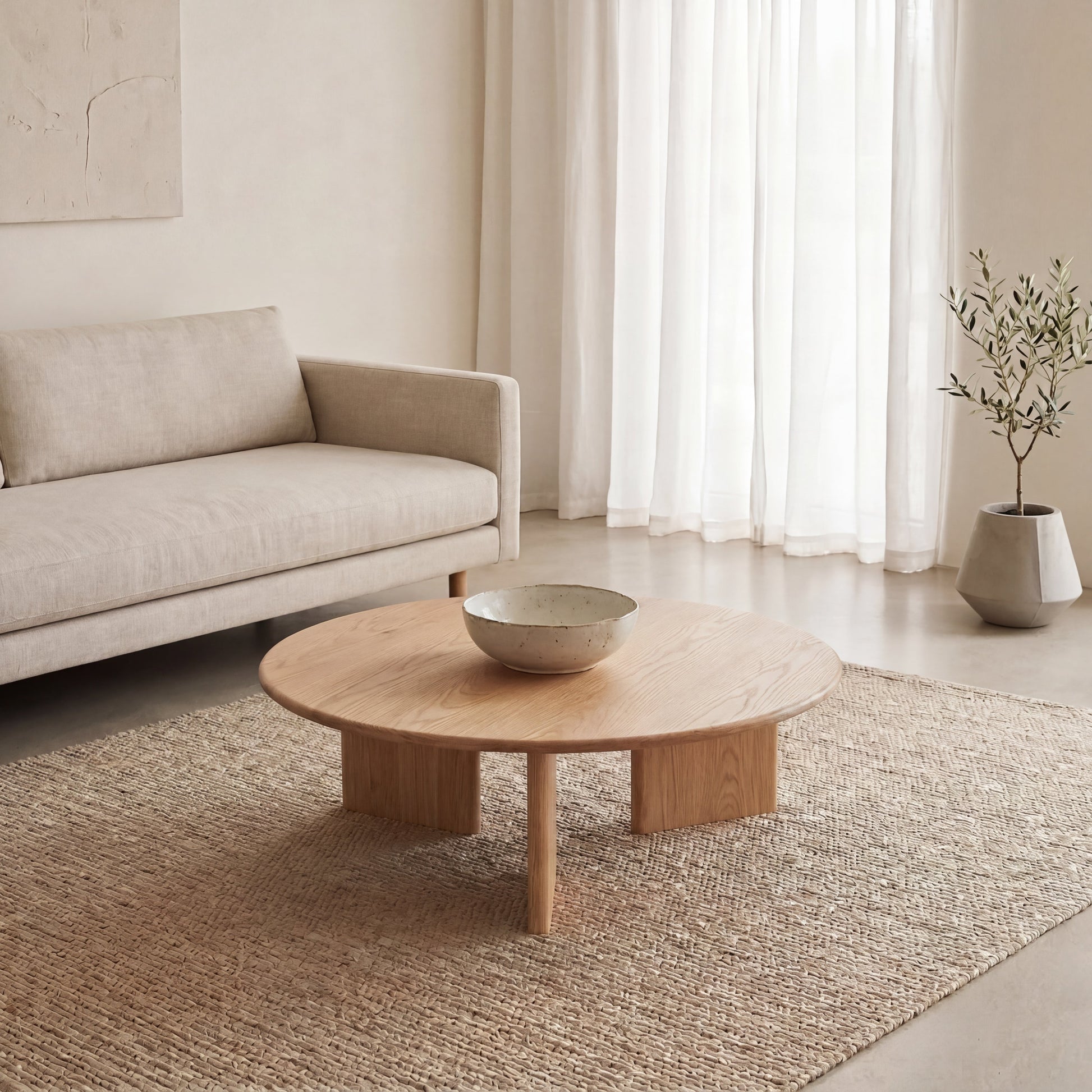 Round coffee table in white oak