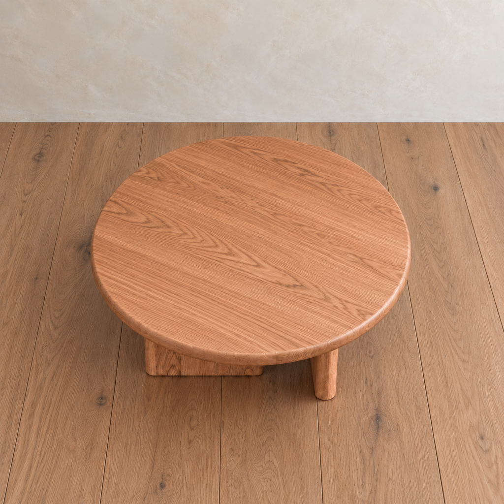 Round coffee table in red oak