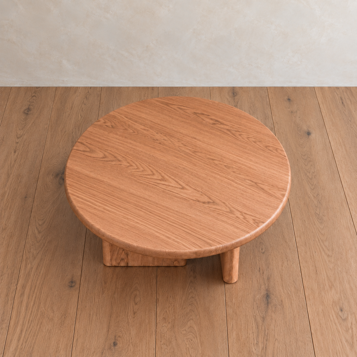 Round coffee table in red oak