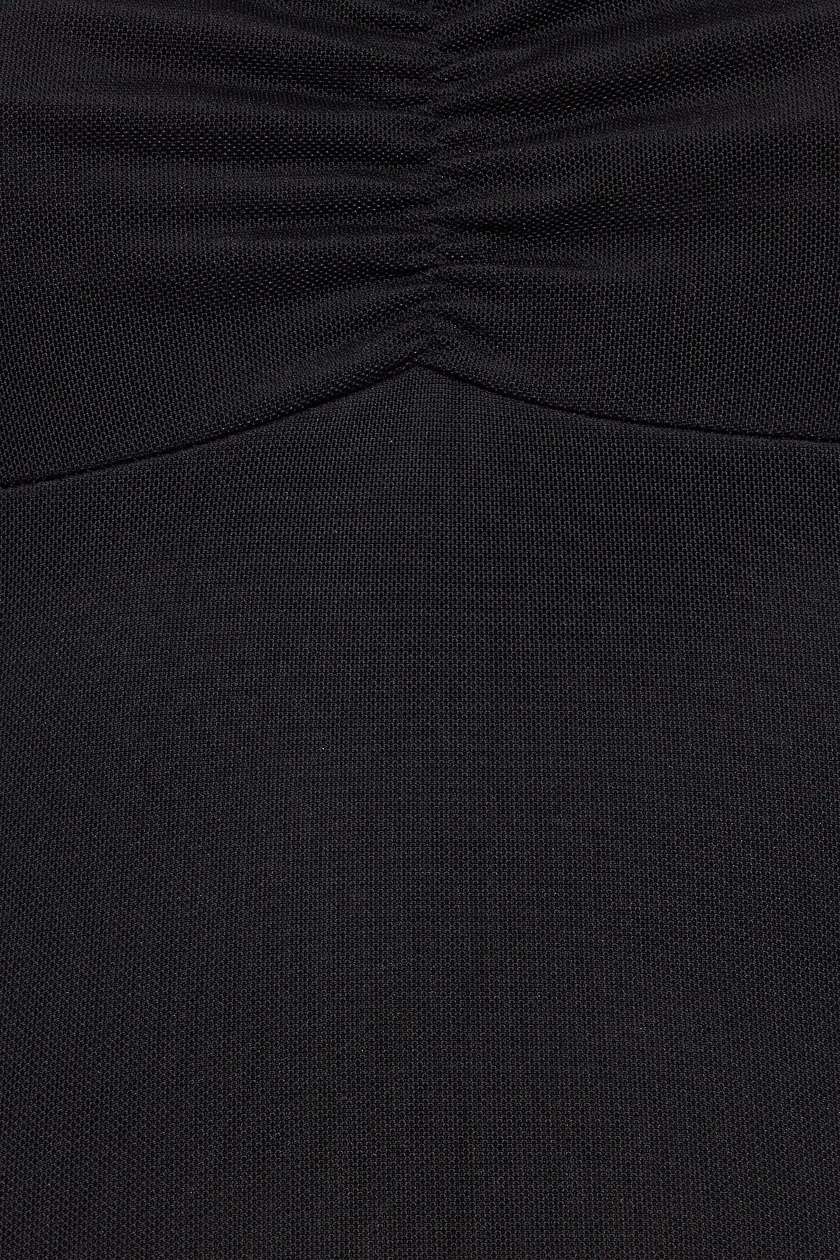 Haut dos nu avec tablier en maille