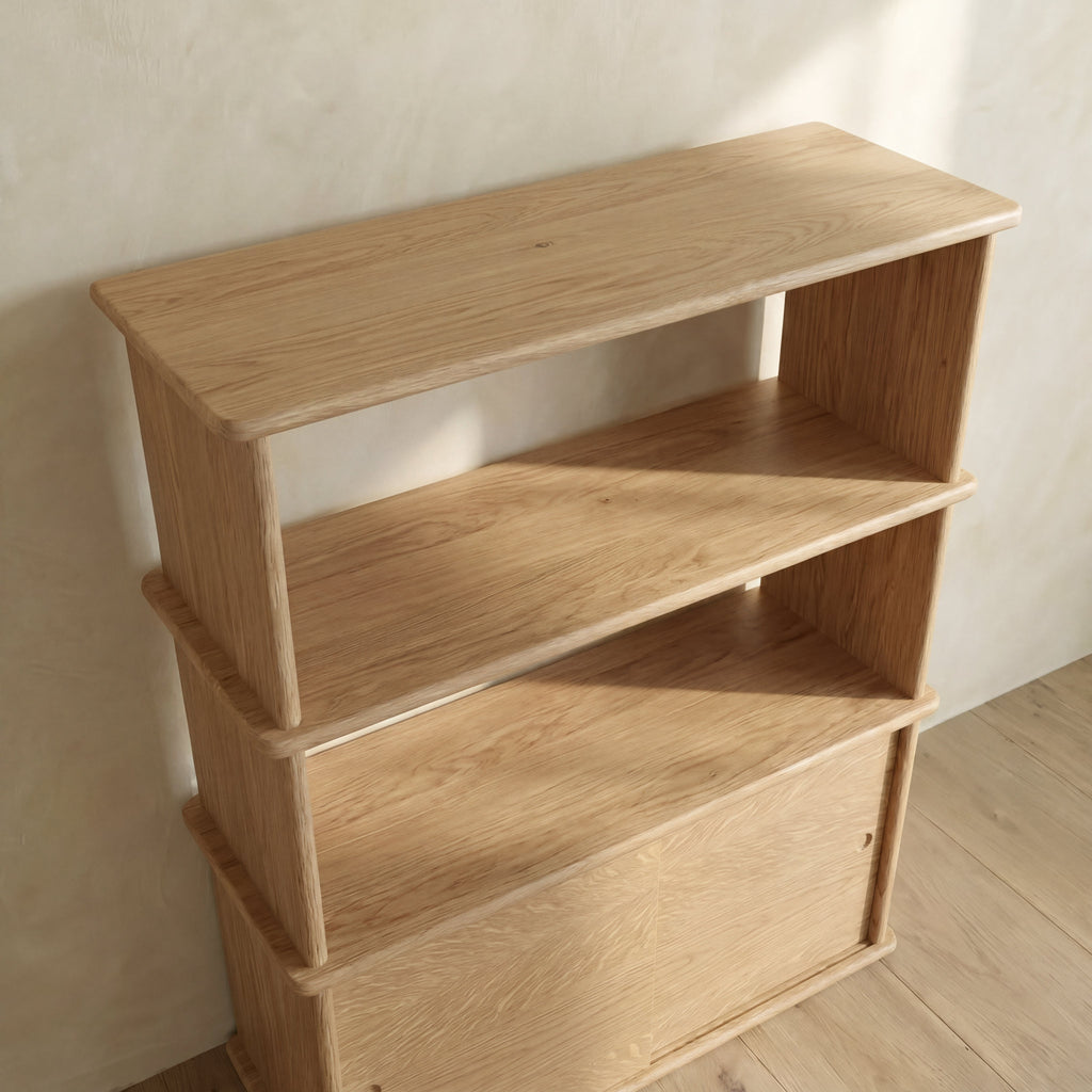 Sliding door bookcase in white oak
