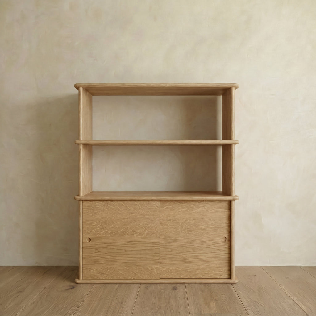 Sliding door bookcase in white oak