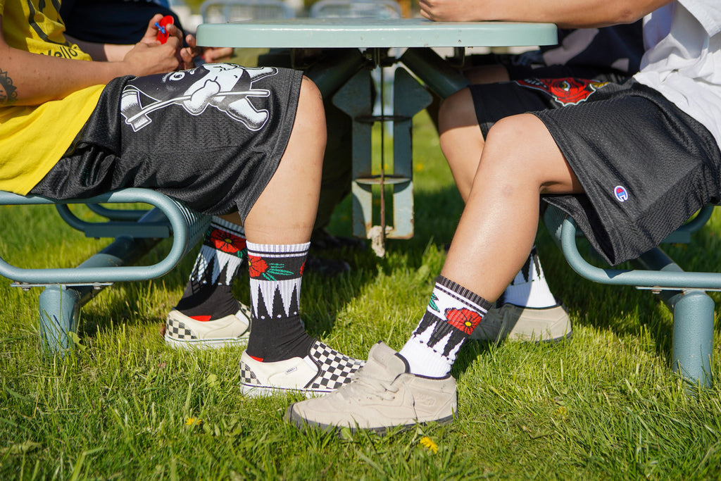 Chaussettes blanches à fleurs géométriques