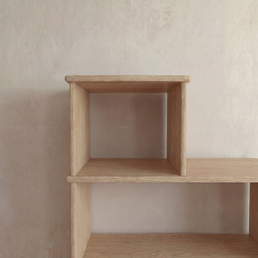 Step bookshelf in white oak