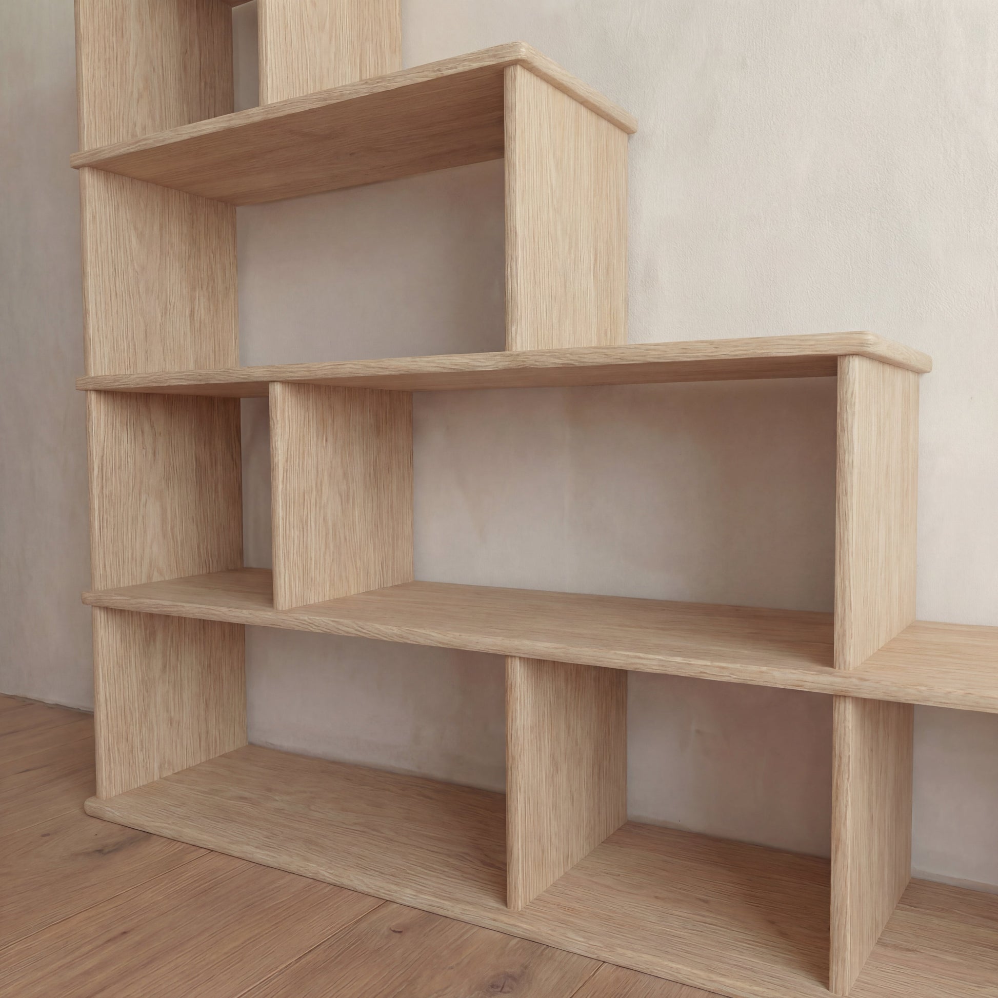 Step bookshelf in white oak