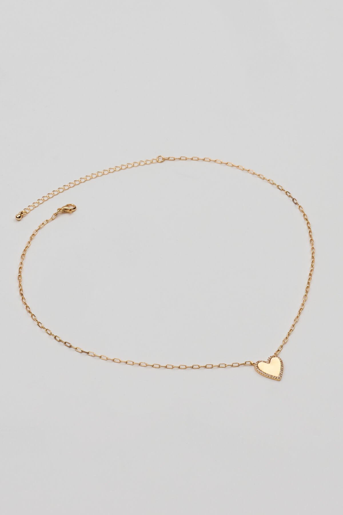 Collier chaîne trombone cœur serti de pierres précieuses
