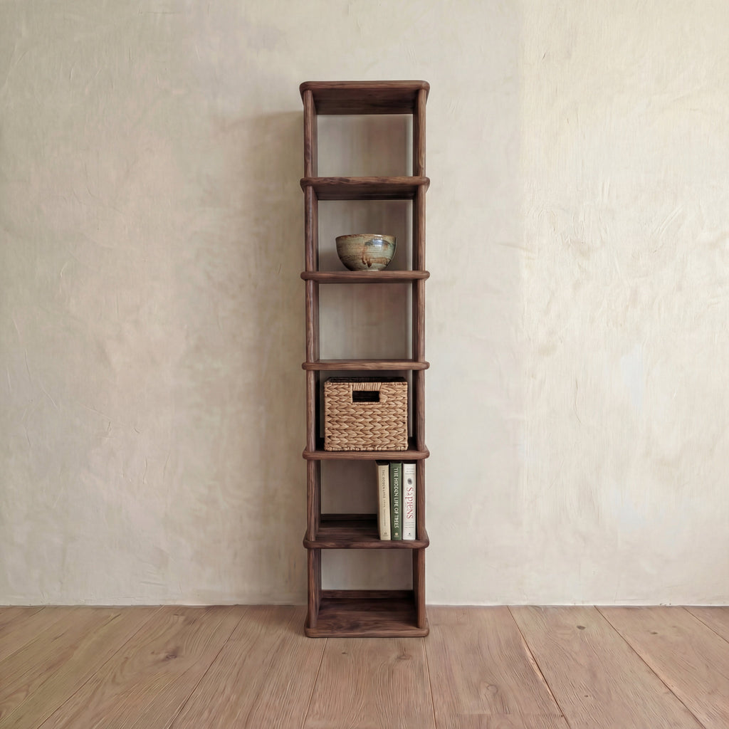 Tall narrow bookcase in walnut