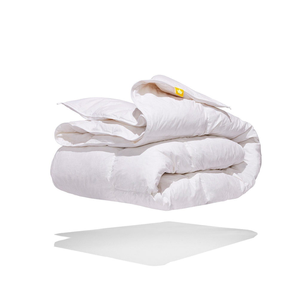Couette en plumes et duvet blanc