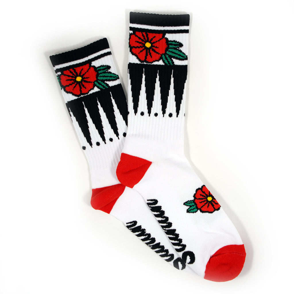 Chaussettes blanches à fleurs géométriques