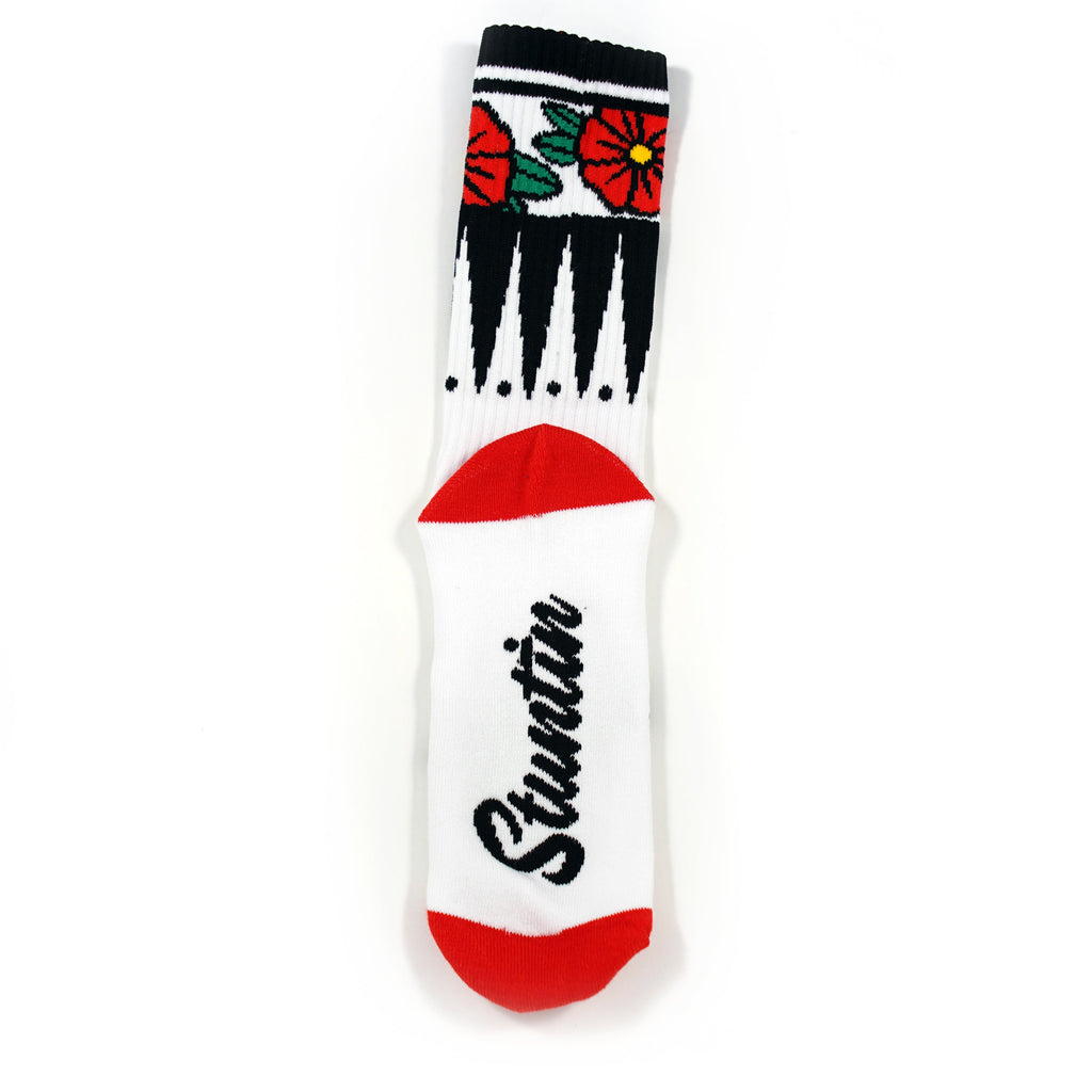 Chaussettes blanches à fleurs géométriques