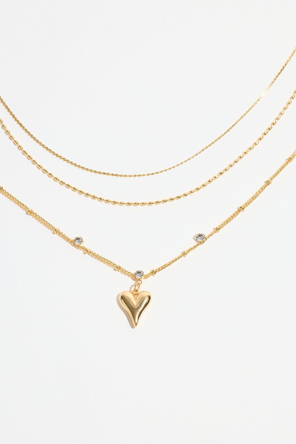 Collier à pois avec pendentif en forme de cœur superposé