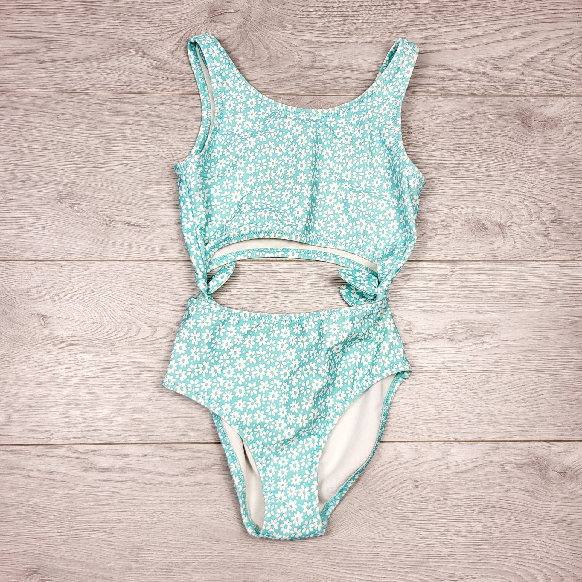 SHYS2 - Maillot de bain une pièce Oshkosh turquoise à imprimé floral et découpes. Taille 8