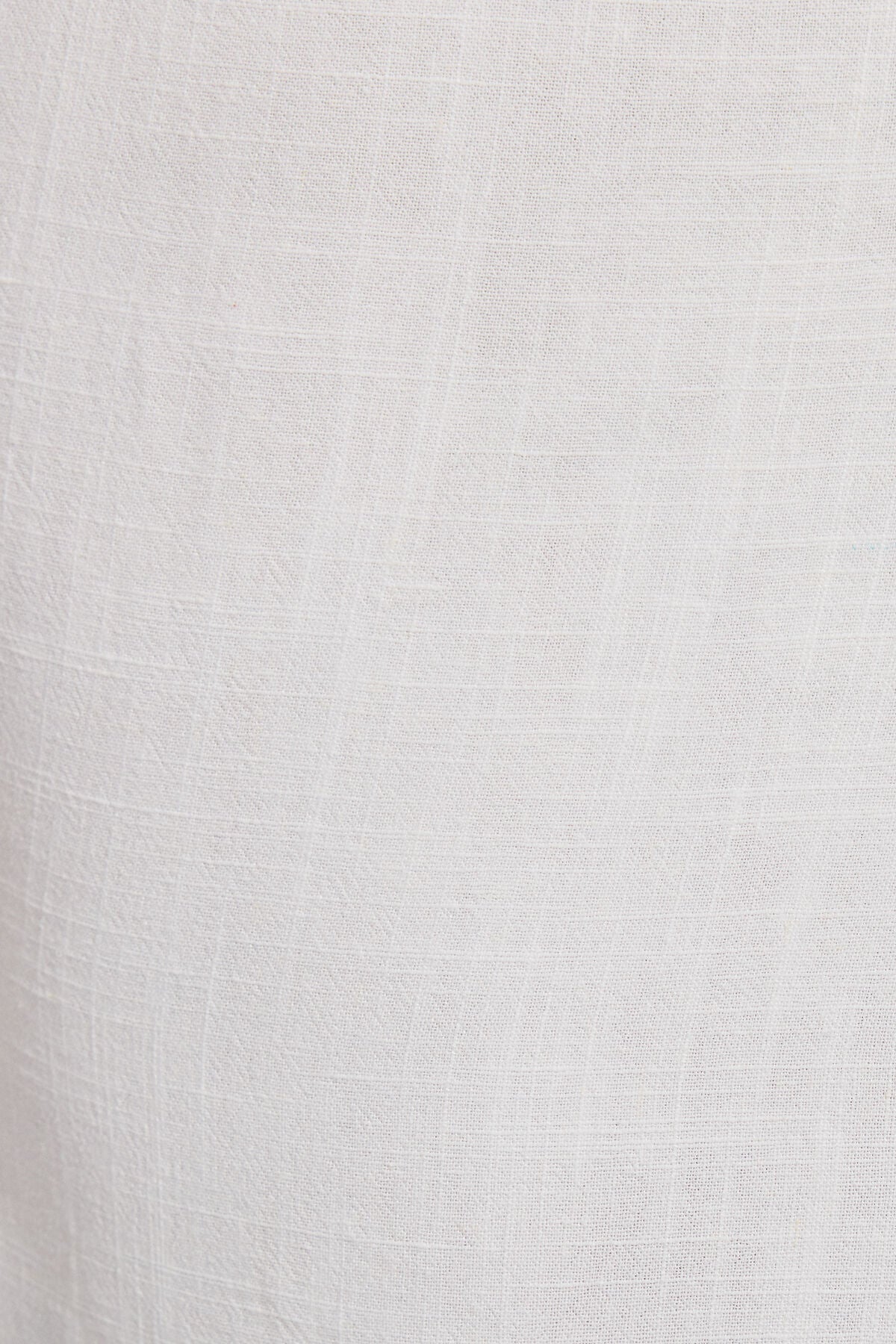 Débardeur en lin noué sur le devant